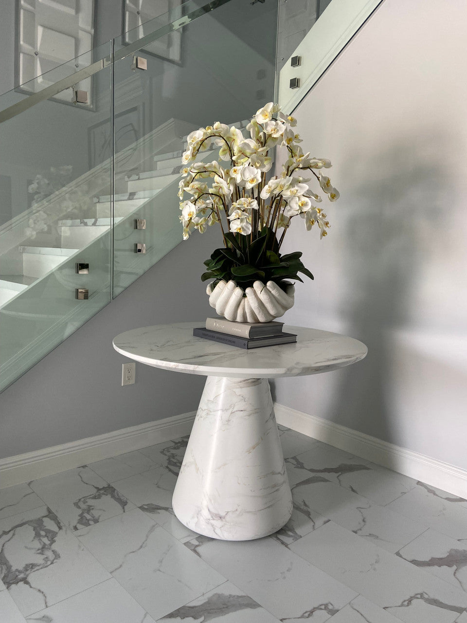White Phalaenopsis Orchids in White Open Hands Sculpture Vase