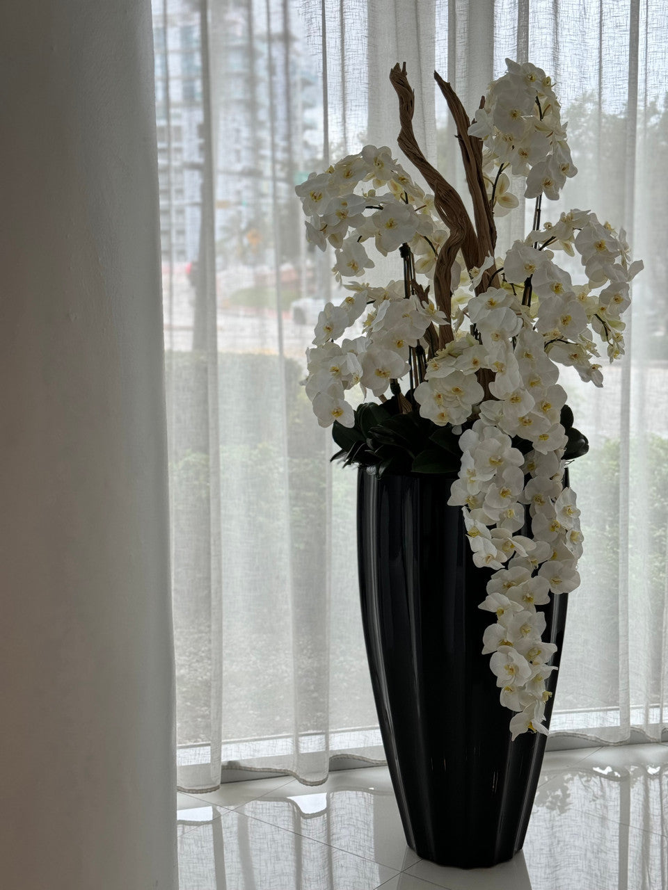 San Jose Planter in Glossy Black with Cascading White Orchids