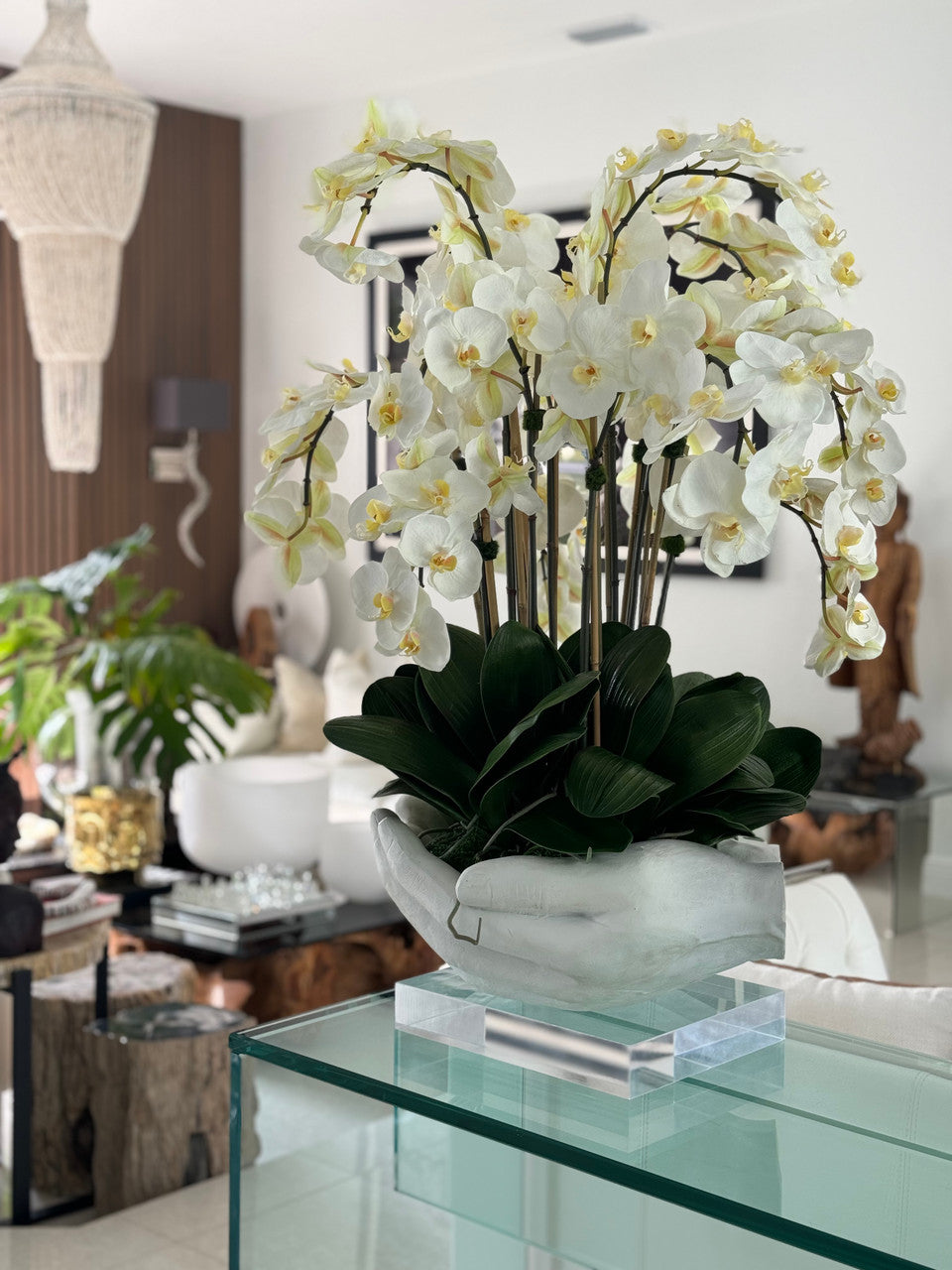 White Phalaenopsis Orchids in White Open Hands Sculpture Vase